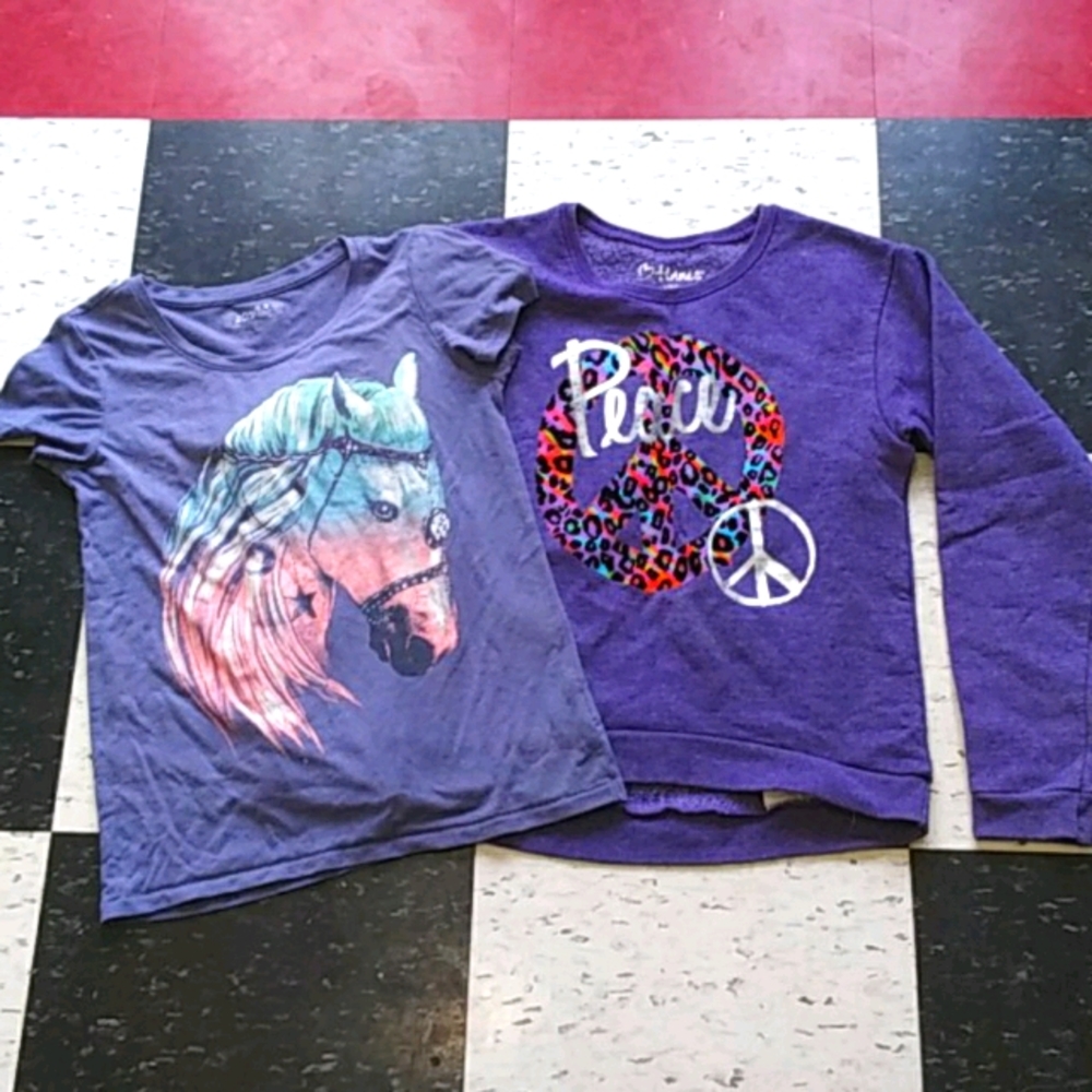 2 girls purple shirts